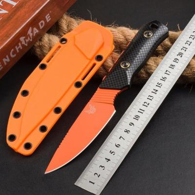 Benchmade butterfly 156000OR hunting knife with black pattern handle and orange blade