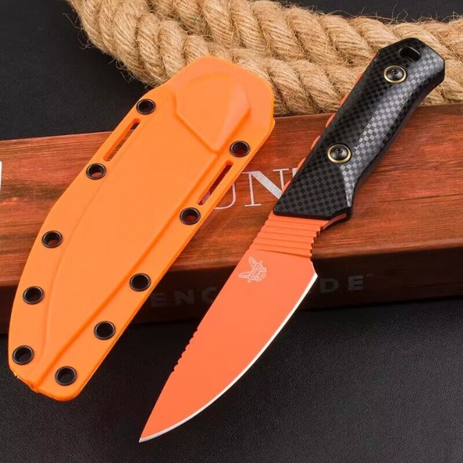 Benchmade butterfly 156000OR hunting knife with black pattern handle and orange blade