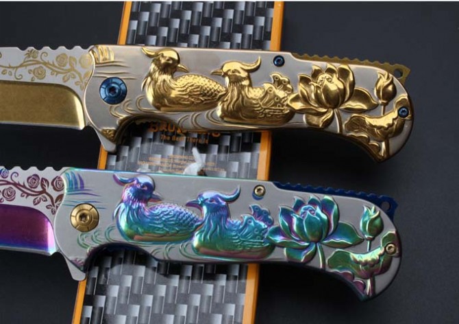 Browning-embossed mandarin duck quick-opening folding knife