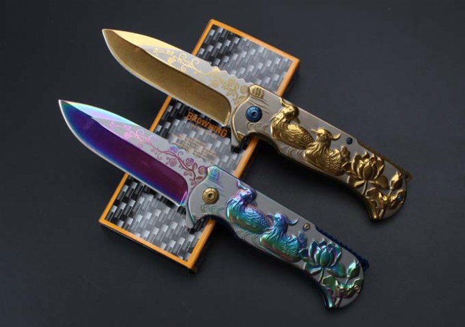 Browning-embossed mandarin duck quick-opening folding knife