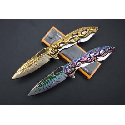 Patterned skull bearing quick-opening folding knife