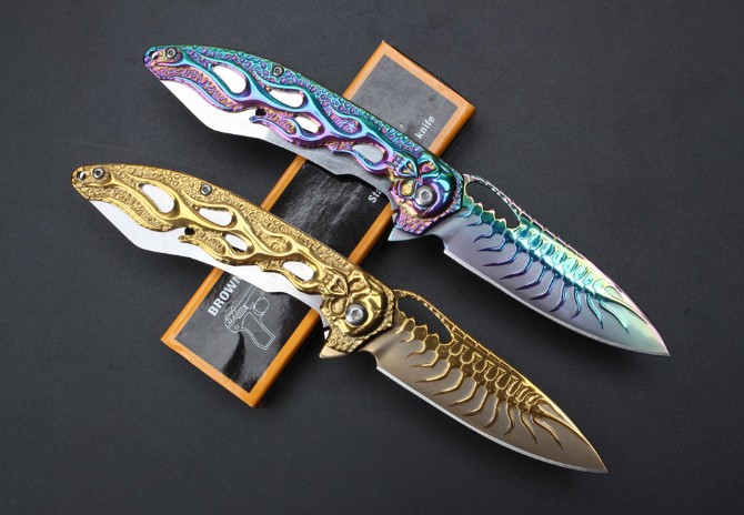 Patterned skull bearing quick-opening folding knife