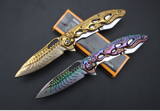 Patterned skull bearing quick-opening folding knife