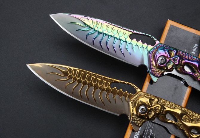 Patterned skull bearing quick-opening folding knife