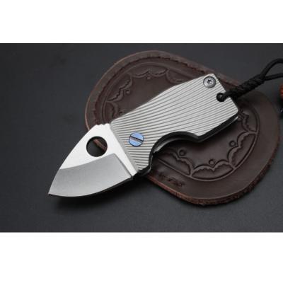 Small fat titanium handle folding knife (D2 steel)