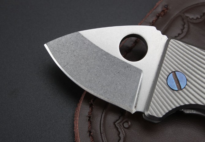 Small fat titanium handle folding knife (D2 steel)