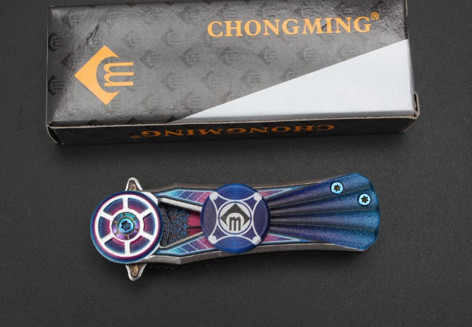 Foreign trade color titanium gyro folding knife