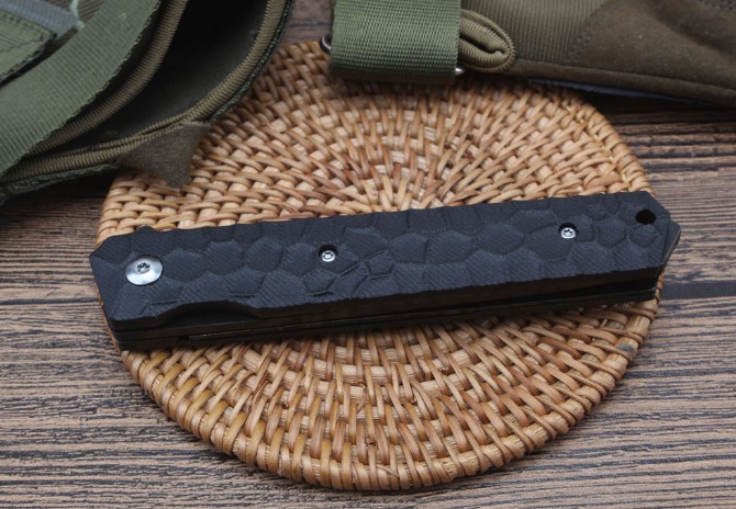 Cube - bearing quick-opening folding knife