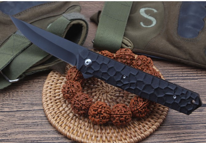 Cube - bearing quick-opening folding knife