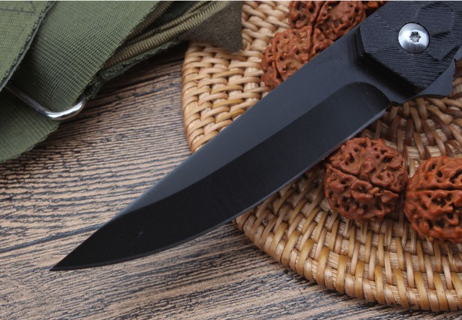 Cube - bearing quick-opening folding knife