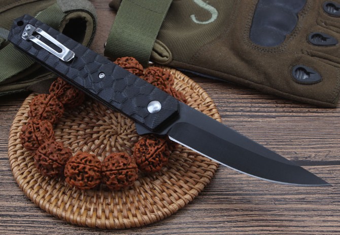 Cube - bearing quick-opening folding knife