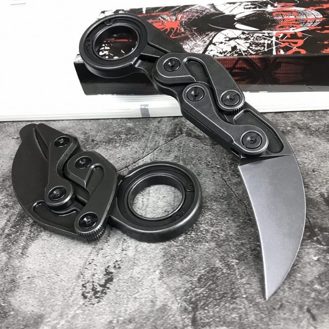 M390 Powder Steel-Caswell Mechanical Claw Knife