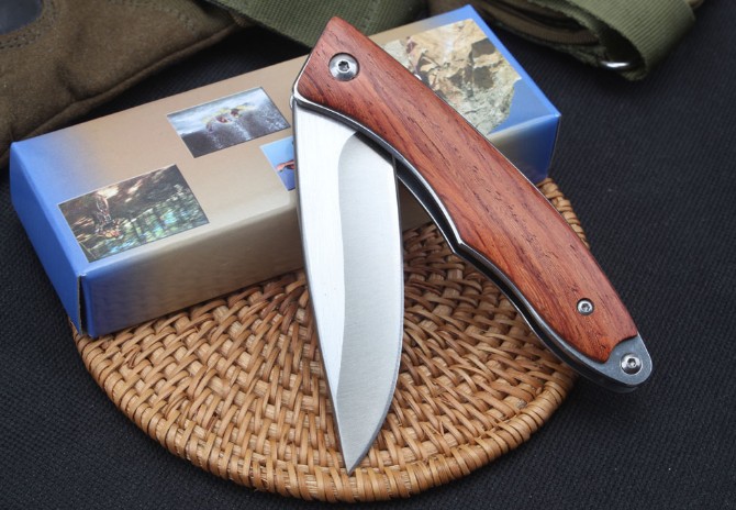 Lark bearing quick opening folding knife