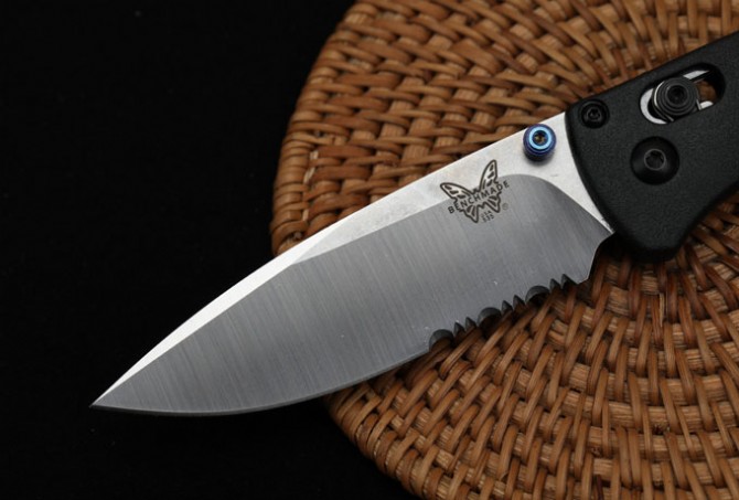 New version of butterfly 535 folding knife (black handle and half teeth)