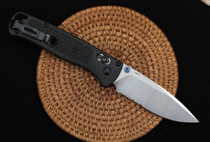 New version of butterfly 535 folding knife (black handle and half teeth)