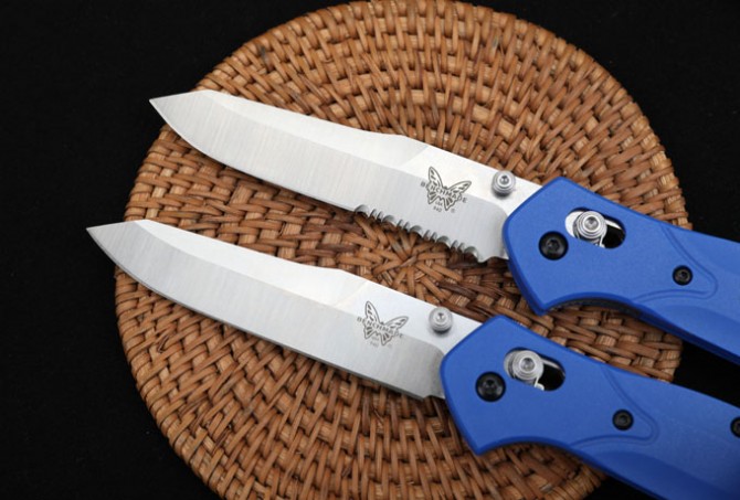 Butterfly 940 folding knife (blue handle, half teeth - full blade)