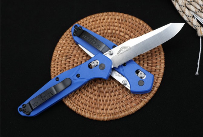 Butterfly 940 folding knife (blue handle, half teeth - full blade)