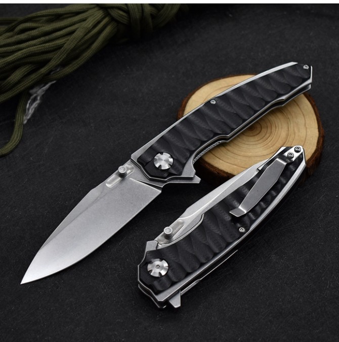 M390 python folding knife