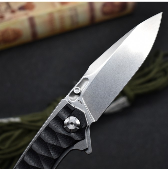 M390 python folding knife