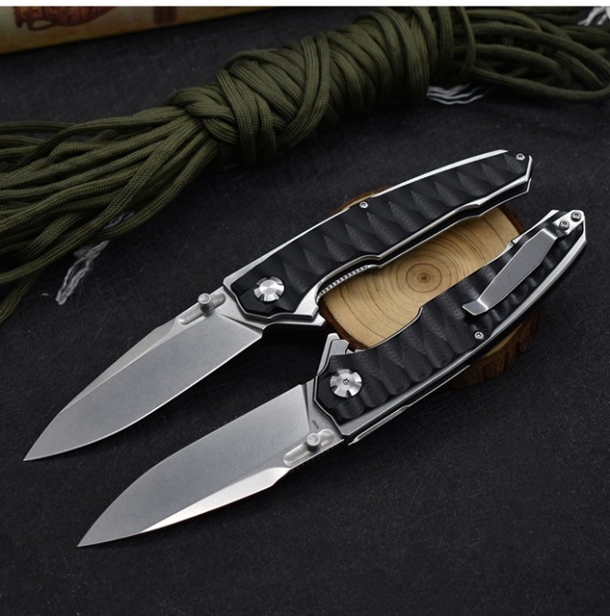 M390 python folding knife