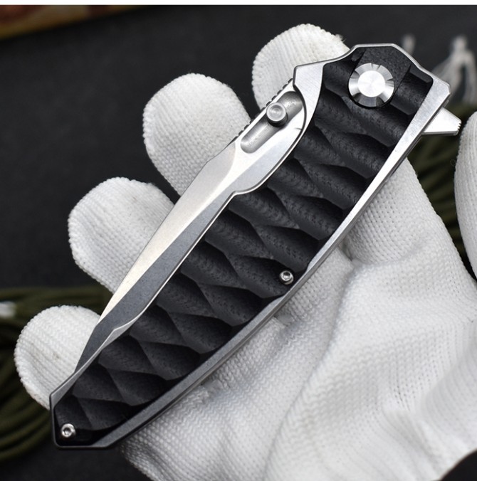 M390 python folding knife