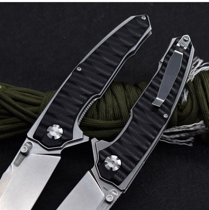 M390 python folding knife