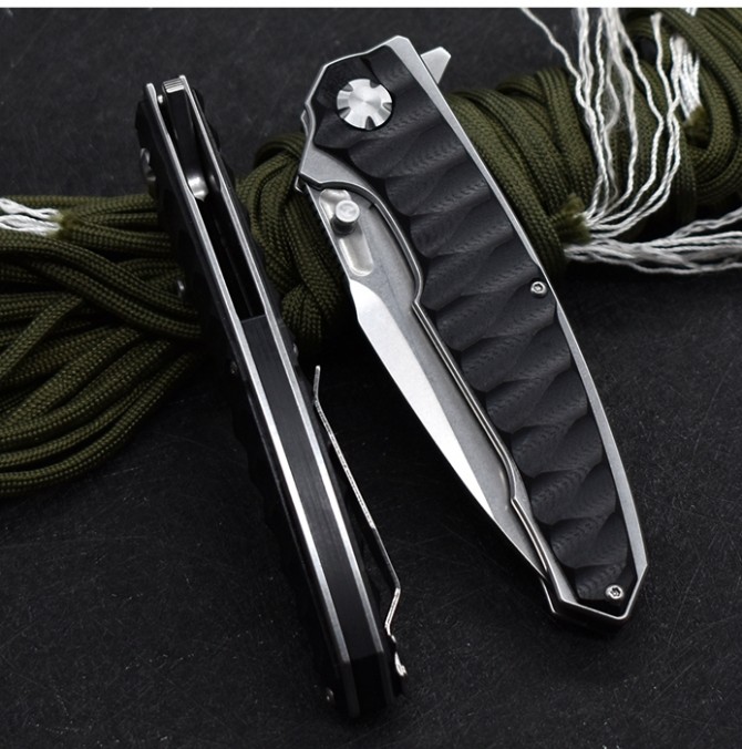 M390 python folding knife