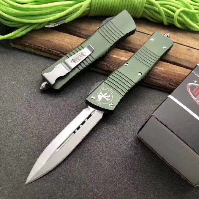 Re-engraved Microtech Cerberus jumping knife