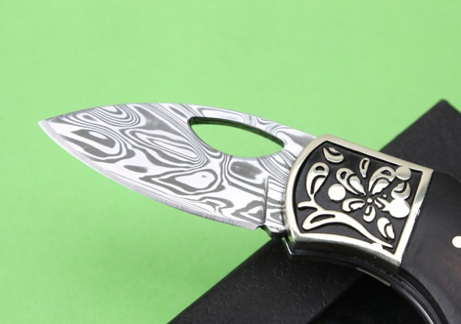 Imported Swedish powder Damascus folding knife