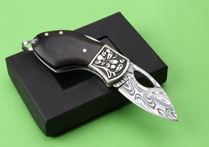 Imported Swedish powder Damascus folding knife