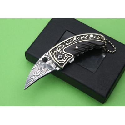 Swedish powdered Damascus folding knife (white copper engraved claws)