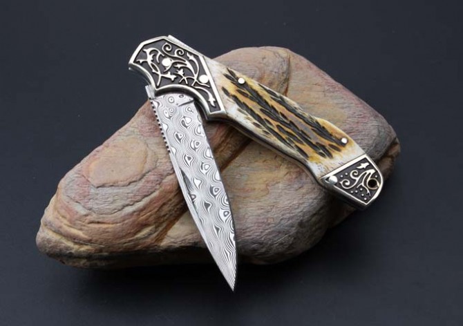 Imported Ruifeng Damascus steel antler handle folding knife