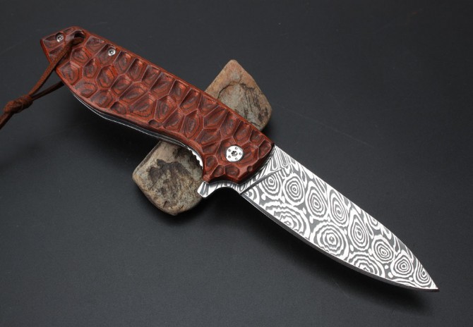 Imported Swiss powdered Damascus Spanish colored folding knife