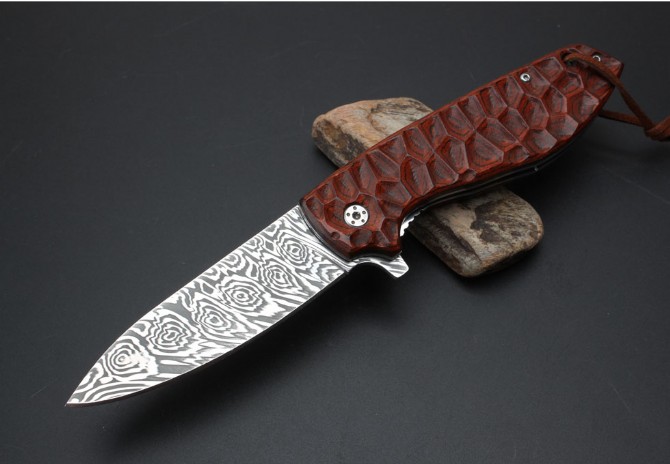 Imported Swiss powdered Damascus Spanish colored folding knife