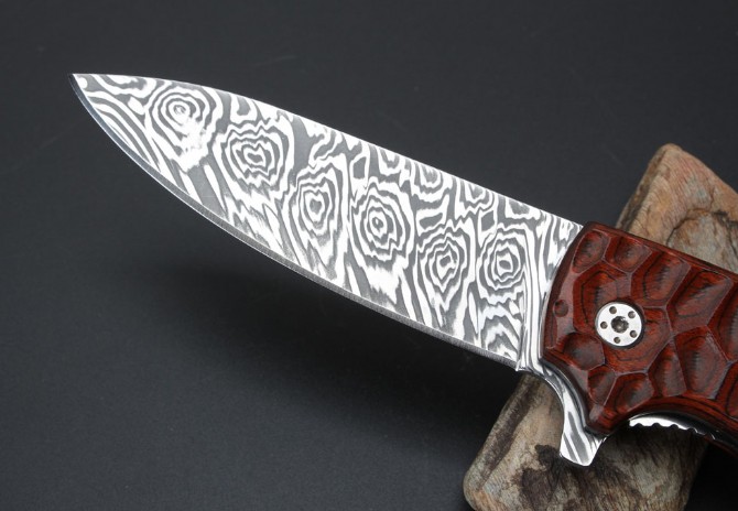 Imported Swiss powdered Damascus Spanish colored folding knife