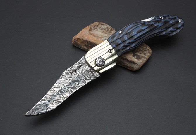 Imported Swiss powdered Damascus Blue Magic folding knife