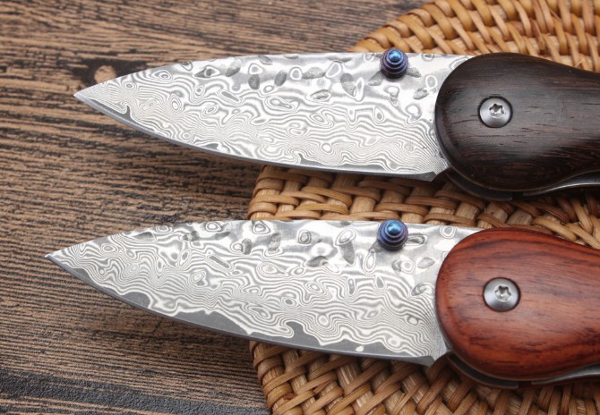 Small grenade Damascus folding knife