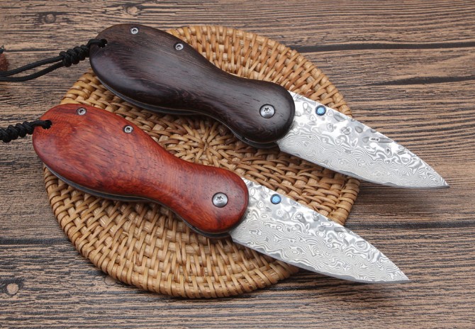 Small grenade Damascus folding knife