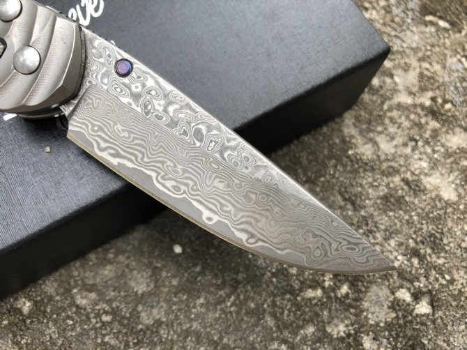 Christopher-Damascus titanium handle folding knife (wavy pattern)